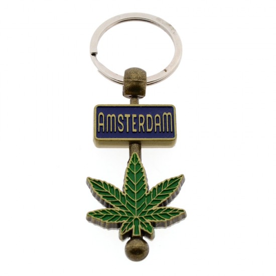 Bronze-colored metal Amsterdam key ring with a cannabis leaf. Particularly beautiful key ring with the cannabis leaf and nameplate on the inside rotating around the axis of the key ring