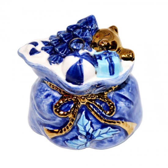 Delft blue gift bag with gifts, a gold teddy bear and gold ribbon. Very detailed Christmas ornament with blue hanging ribbon.