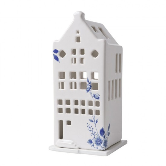 Ceramic tealight holder of a Dutch canal house with spout facade with elegant Delft blue decoration. The tea lights are easy to replace because the house is on a separate platform.