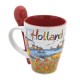 Ceramic cup and spoon set beautifully decorated in color with typical Dutch scenes such as windmills, tulips, clogs, cows, a bicycle and a couple in love.