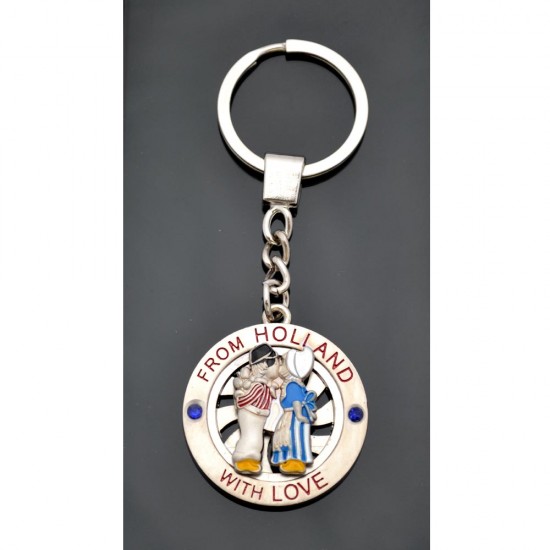 Metal keyring with a kissing couple and the text From Holland With Love.
