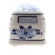 A hand-painted Delft blue, nostalgic Volkswagen camper van from the 1960s. This ceramic camper van is hand-decorated with a traditional Delft blue floral motif.