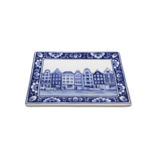 Small Delft blue applique with a typical Dutch scene with a windmill framed with traditional Delft blue floral decorations