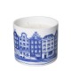 Bring a touch of quintessential Dutch charm into your home with this luxurious scented candle. The candle is poured into a ceramic holder, beautifully painted in classic Delft blue with a row of charming canal houses.