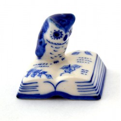 Delft blue miniature owl reads book Delft blue miniature owl reads book